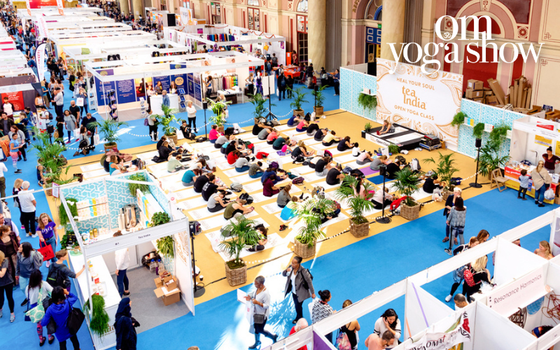 A pair of weekend passes to the OM Yoga Show